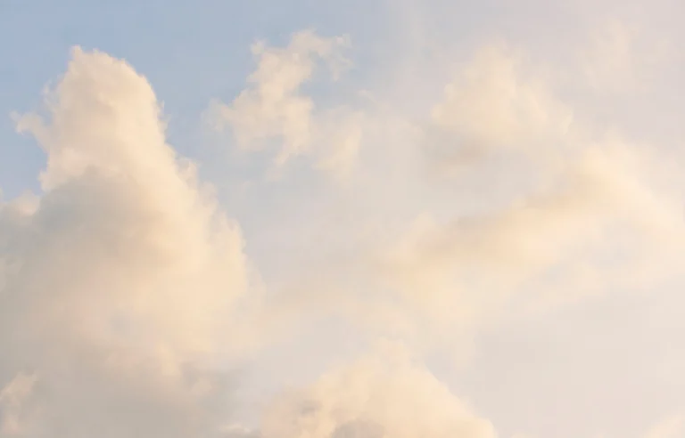 Aesthetic stock image of clouds in the sky creating a pink hue. The image is purely for decorative use only to support the blog post on core values.
