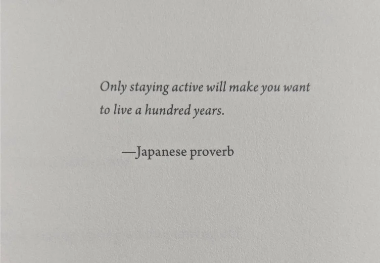 Quote stock image that says, Only staying active will make you want to live a hundred years — Japanese proverb in black text on a grey background