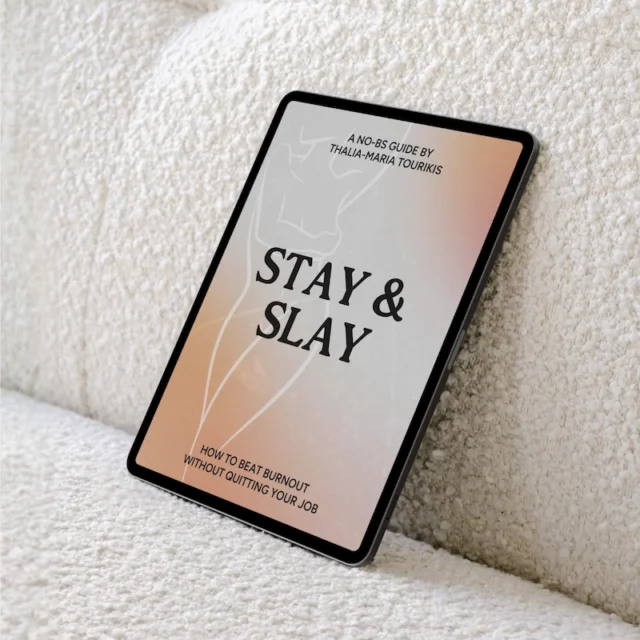 A stylised iPad mock-up image showing the cover of an ebook, Stay & Slay; How to beat burnout without quitting your job. The ipad is leaning against a white boucle sofa